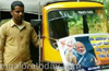 Modi fan, auto driver, carries people to banks free